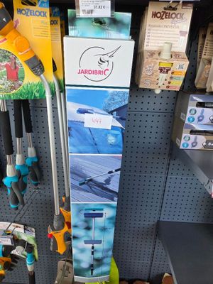 many different tools on the wall in the store