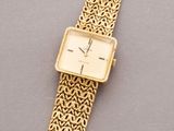 an 18k gold ladies ' s wrist watch