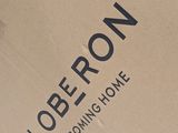 a cardboard box with a logo on it sitting on a table
