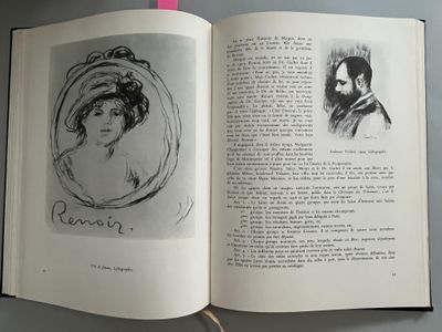 an open book with a drawing of a woman on it