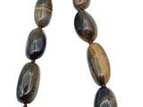 tiger eye bead necklace on a white background