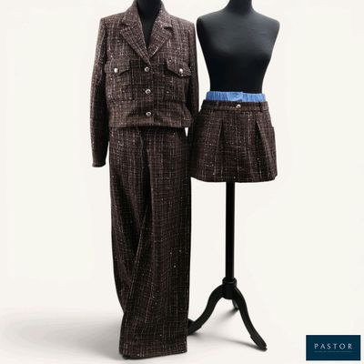 two mannequins that are standing next to each other