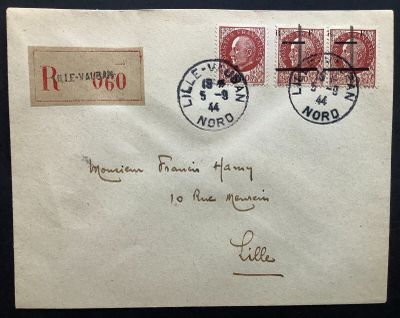 an old envelope with two stamps and a stamp stamp on it