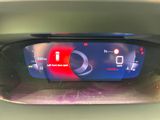 a digital display on the dashboard of a car