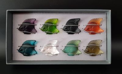 a picture of a picture of a box of glass fish