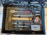 a tool kit in a case on a table