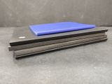 a stack of three laptops sitting on top of each other