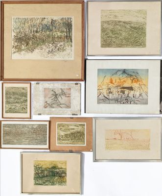 a lot of framed pictures on the wall of a room