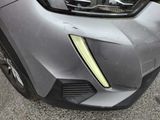 a close up of the front bumper of a car