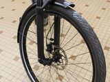 a bicycle that is parked on the floor in a store