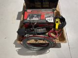 a picture of a box with some wires and a remote control