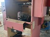 a pink machine that is sitting in a building