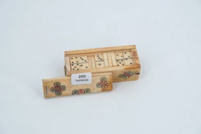 a wooden box that has a domino game in it