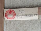 a piece of paper that has a stamp on it