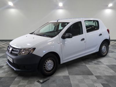 a picture of a small white van parked in a garage