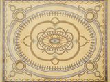 une peinture représentant un médaillon circulaire sur fond beige