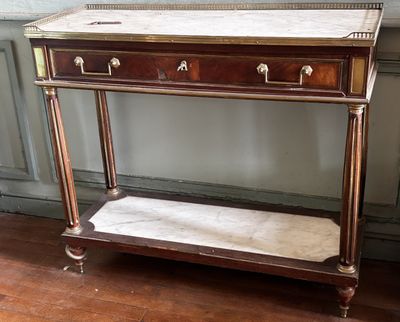 une table avec un plateau en marbre et deux tiroirs