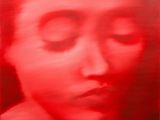 a red painting of a woman ' s face with her eyes closed
