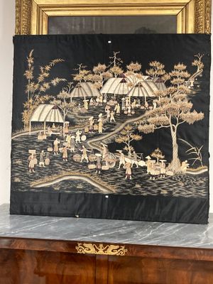 Vietnam, vers 1930. Village animé.