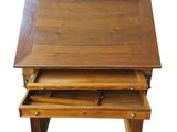 an image of a wooden table with three drawers on it