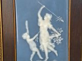 an image of a picture of a woman holding a sword and a man with a dog