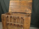 an old wooden chest with a bunch of tools inside of it