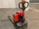 a picture of a forklift with two red cylinders on it
