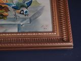 a picture of a painting of a bird on the wall