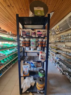 a shelf with a lot of items in it in a store
