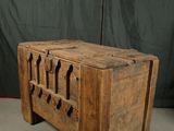 a wooden table with a drawer on top of it