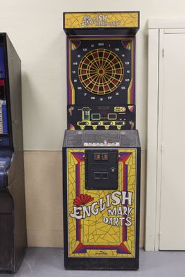 two machines that are next to each other on the floor
