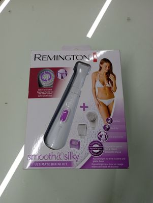 packaging of a remington smooth and silky electric shaver on a table