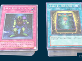 two cards that are sitting on top of each other