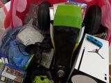 a basket full of toys and games on a table