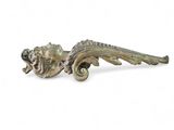 an image of a metal sculpture of a lizard on a white background