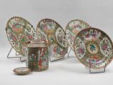 six chinese famille plates and a cup and saucer