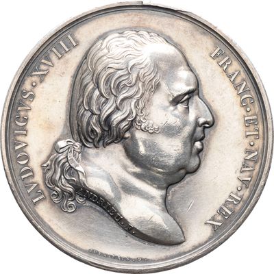 une image représentant une pièce d'argent sur laquelle figure le portrait d'un homme