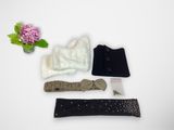 a bunch of clothing and accessories laid out on a table
