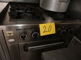 une image représentant une cuisinière avec une casserole posée dessus