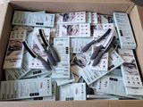 a lot of tickets in a box with scissors in it