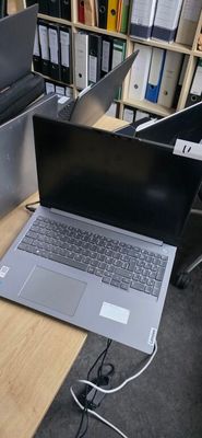 two laptops that are sitting on a desk