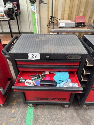 un chariot à outils rouge muni de deux tiroirs