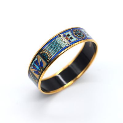 a close up of a ring on a white surface