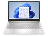 l'ordinateur portable est ouvert sur une surface blanche avec un fond bleu