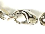 a close up of a chain with a lock on it