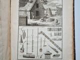 an old book with a picture of a farm and tools on it