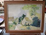 a picture of a painting on a easel in a room