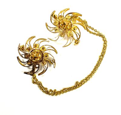 pair of gold tone spider brooches on a gold plated chain