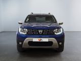 a picture of a blue pick up truck parked in a garage