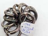 a bunch of metal rings with a price tag on them